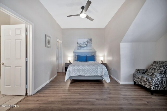 8245 E Bell Rd Unit 133, Scottsdale, AZ 85260 - bedroom featuring wood finished floors, baseboards, and a ceiling fan