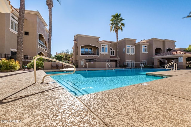 8245 E Bell Rd Unit 133, Scottsdale, AZ 85260 - pool with a patio and fence