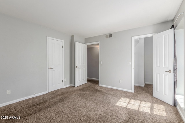 200 E Southern Ave Unit 226, Tempe, AZ 85282 - unfurnished bedroom with carpet floors, baseboards, and a closet