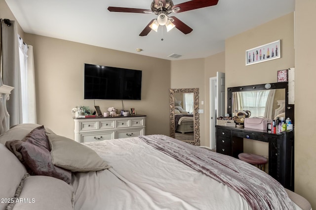 bedroom featuring ceiling fan