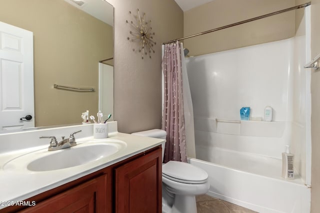 bathroom featuring tile patterned flooring, toilet, vanity, and shower / bath combo