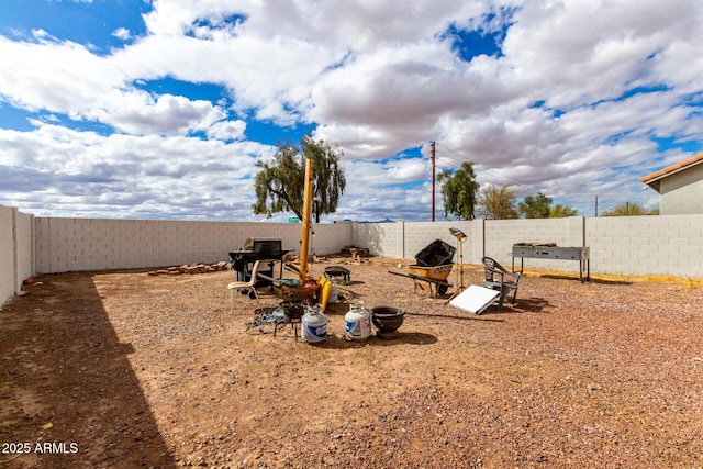 view of yard featuring a fenced backyard