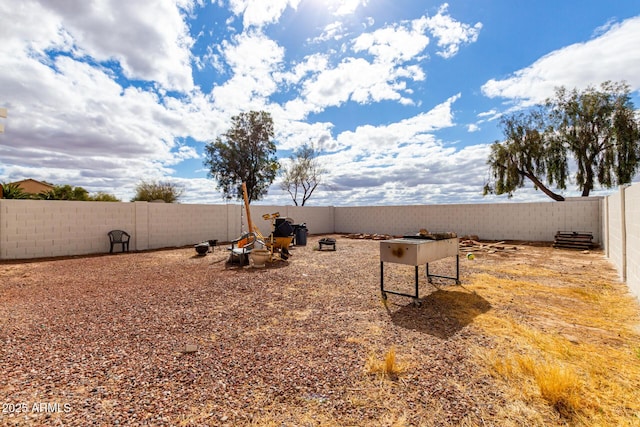 view of yard featuring a fenced backyard