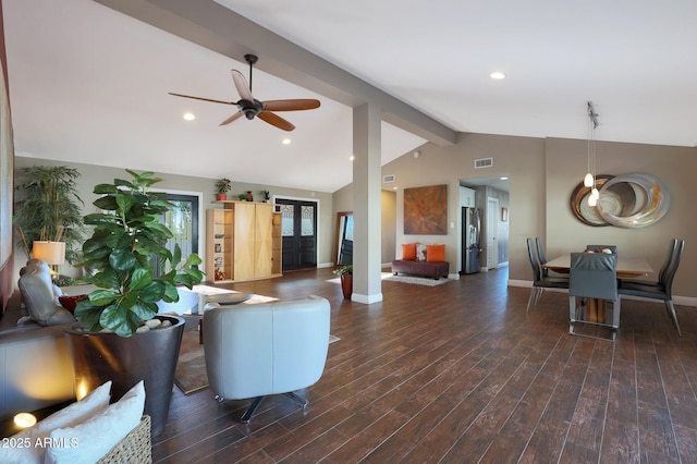 living room with vaulted ceiling with beams, dark hardwood / wood-style floors, and ceiling fan