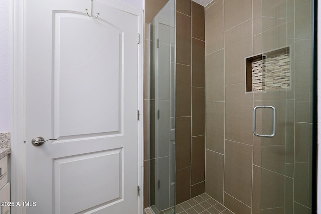 bathroom featuring vanity and walk in shower