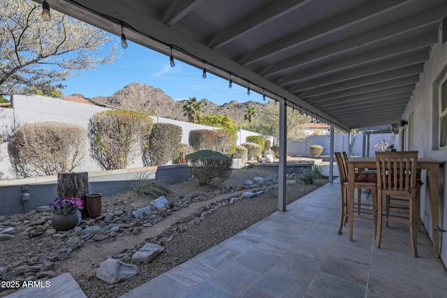 view of patio with a mountain view