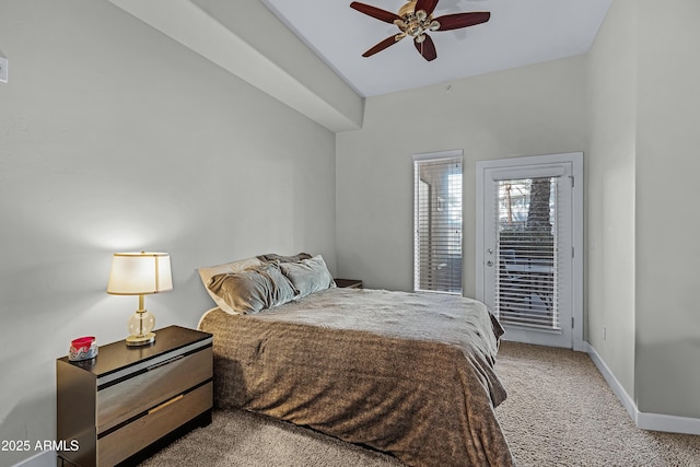 bedroom with access to exterior, ceiling fan, and carpet floors