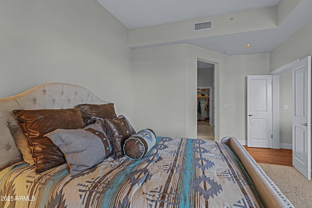 bedroom featuring hardwood / wood-style floors