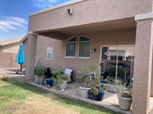 914 W Morelos St, Chandler, AZ 85225 - view of home's exterior with stucco siding and a patio area
