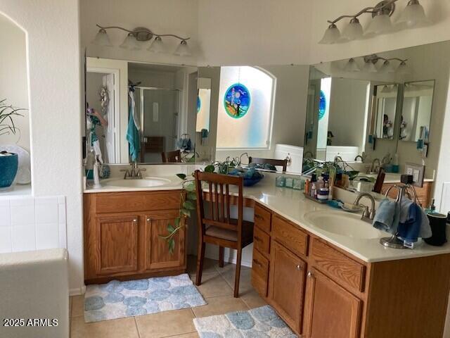 914 W Morelos St, Chandler, AZ 85225 - bathroom with tile patterned floors, a stall shower, and vanity