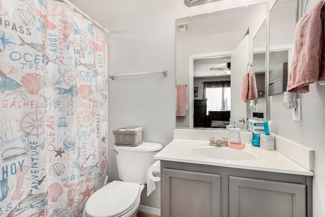 full bath featuring ceiling fan, toilet, vanity, visible vents, and a shower with curtain