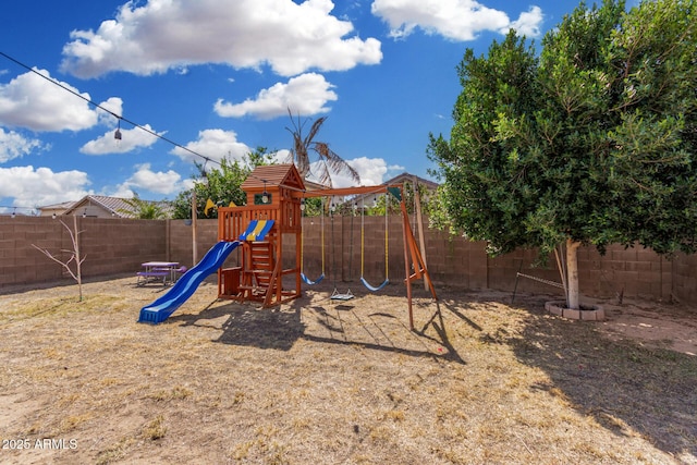 view of jungle gym with a fenced backyard