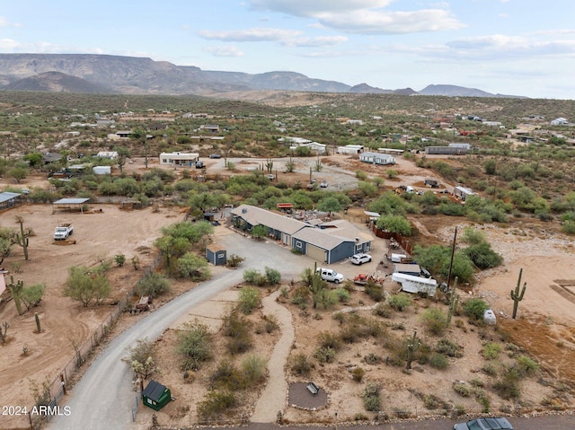 drone / aerial view featuring a mountain view