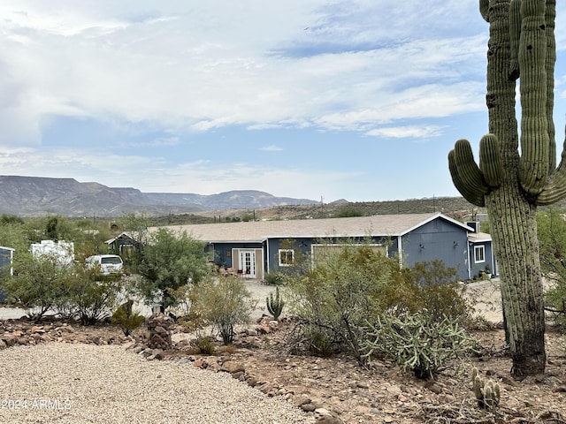 exterior space featuring a mountain view