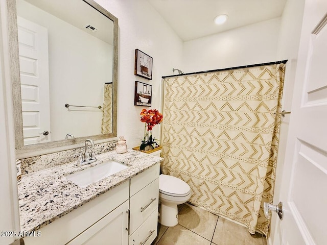 1657 W Monte Way, Phoenix, AZ 85041 - full bath featuring vanity, tile patterned flooring, and a shower with shower curtain