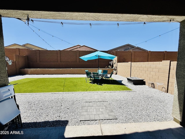 1657 W Monte Way, Phoenix, AZ 85041 - fenced backyard with a patio area