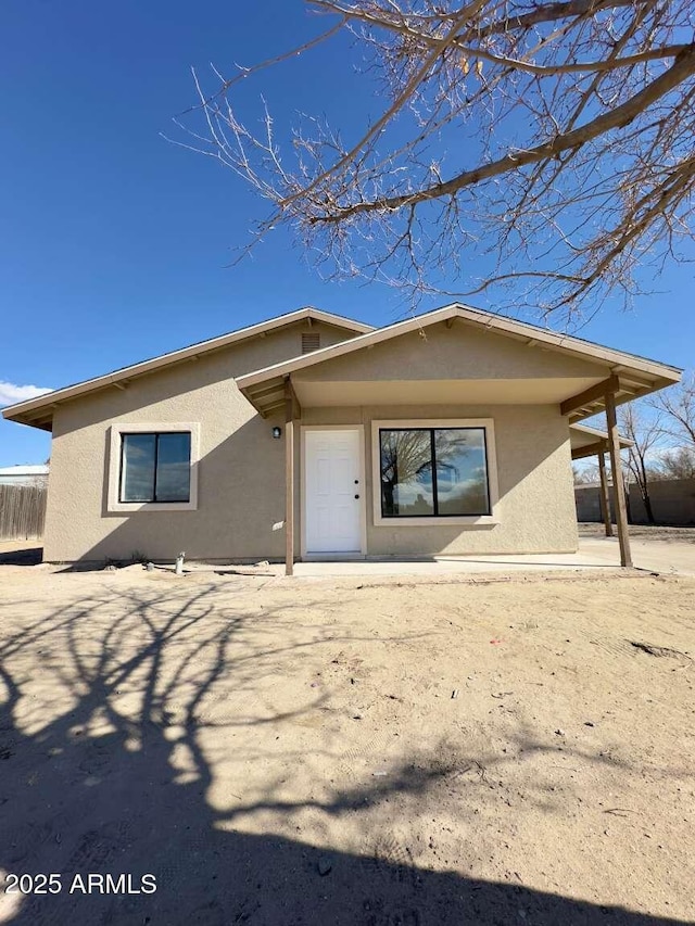 view of front of home featuring a patio