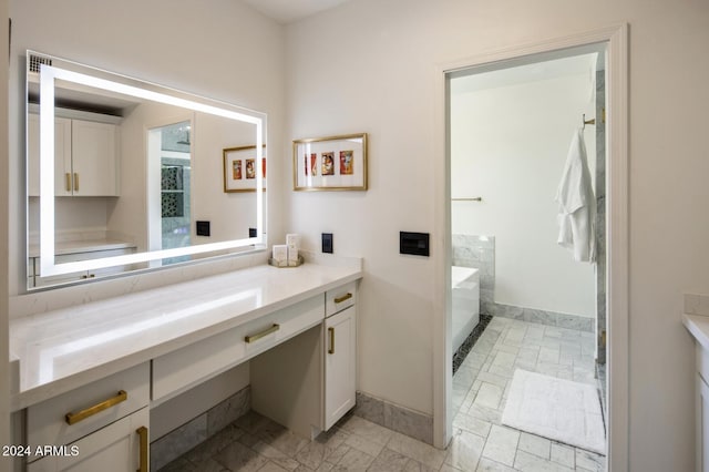 bathroom with walk in shower and vanity