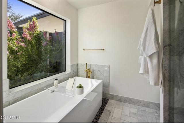 bathroom featuring a tub