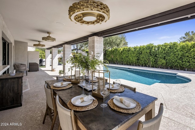 view of pool featuring a patio