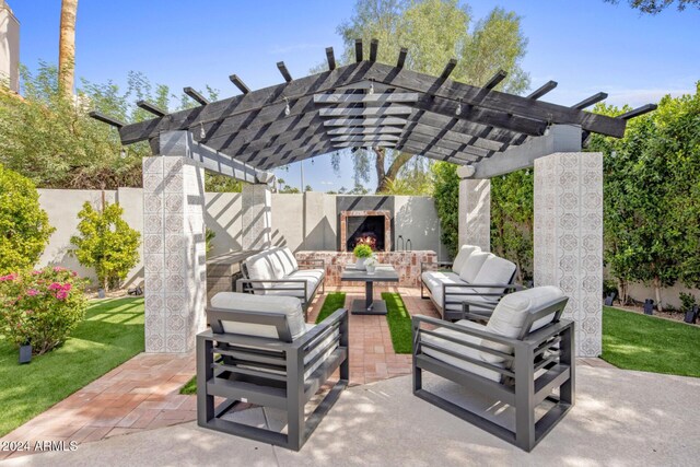 view of patio featuring an outdoor living space with a fireplace and a pergola