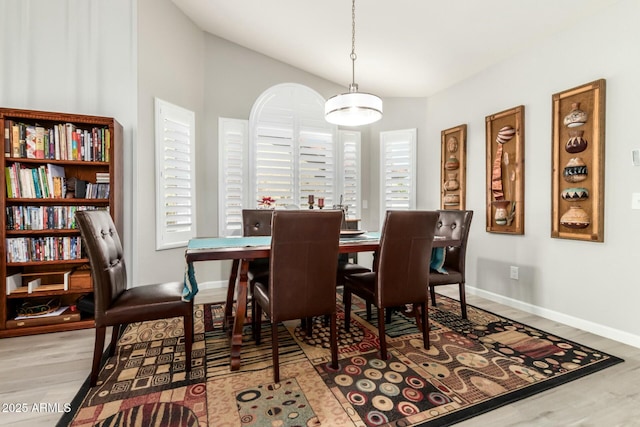 dining area with light wood-type flooring