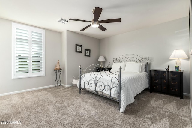 bedroom with ceiling fan and carpet flooring