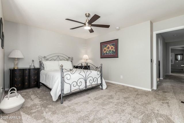 bedroom featuring ceiling fan and carpet floors