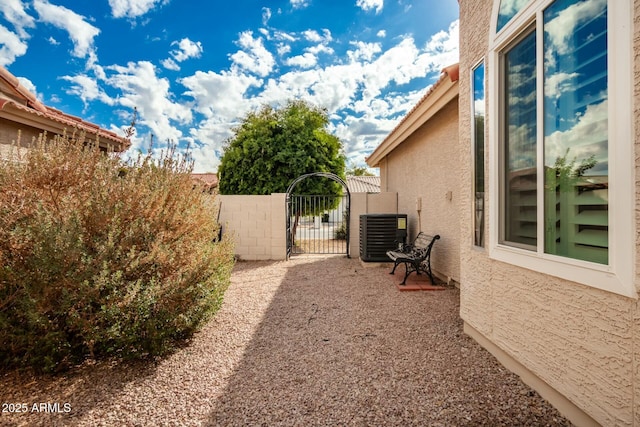 view of yard featuring central AC unit