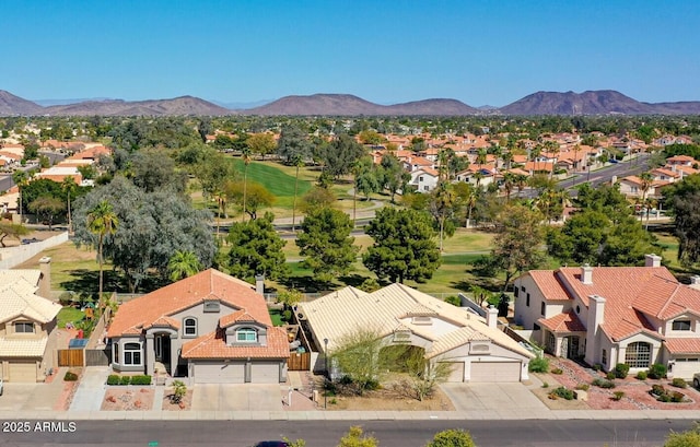 aerial view featuring a mountain view and a residential view