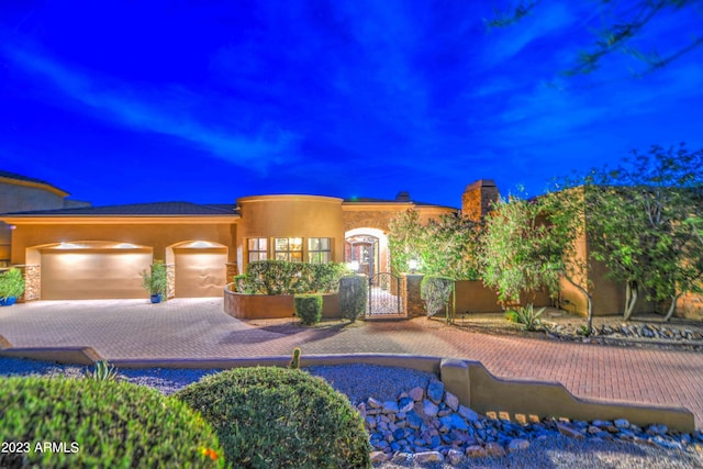 view of front of home featuring a garage