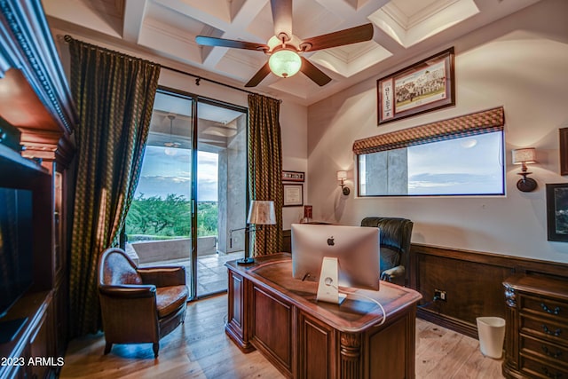 office area with beamed ceiling, coffered ceiling, ceiling fan, and light wood-type flooring