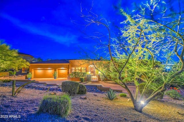 view of front of property featuring a garage