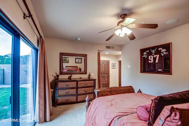 carpeted bedroom featuring ceiling fan and access to exterior