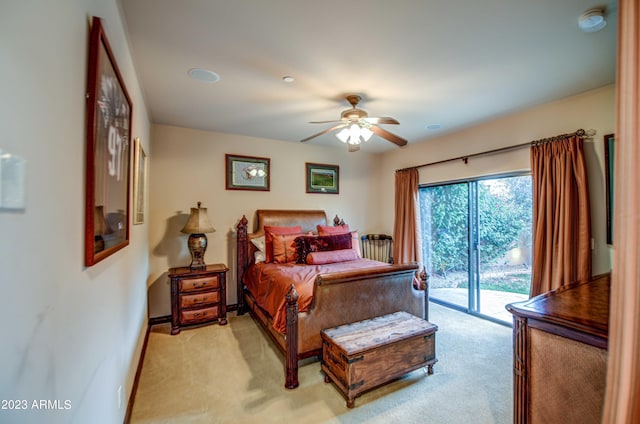 bedroom with ceiling fan, light carpet, and access to outside