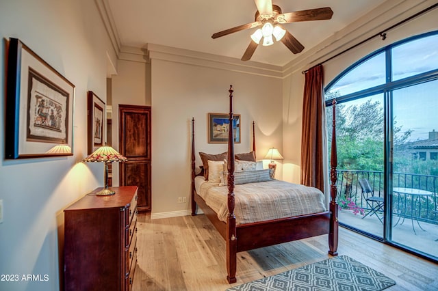 bedroom featuring multiple windows, ceiling fan, access to outside, and light hardwood / wood-style flooring