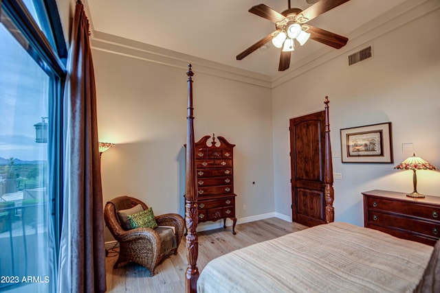 bedroom featuring ceiling fan and light hardwood / wood-style floors