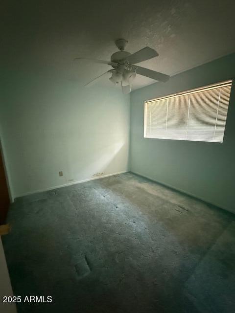 735 E Desert Ave, Apache Junction, AZ 85119 - empty room with carpet and a ceiling fan