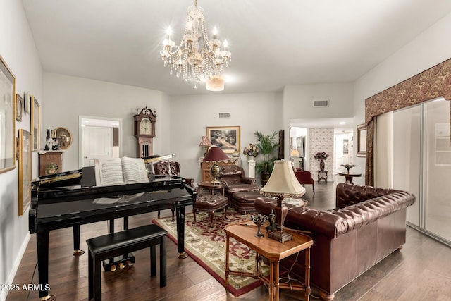 interior space with a chandelier and hardwood / wood-style flooring