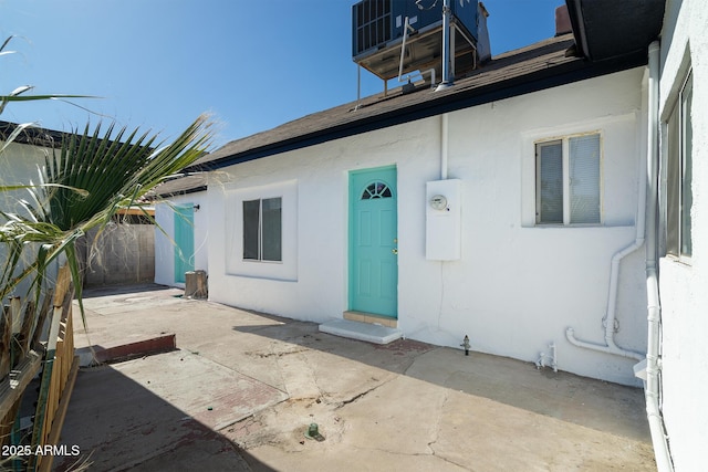 doorway to property with a patio