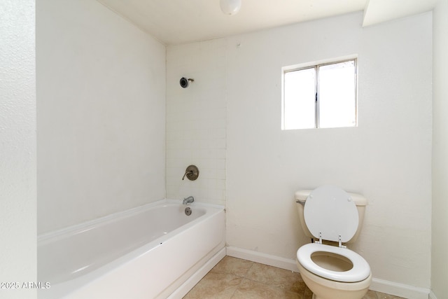 bathroom featuring tile patterned floors and toilet