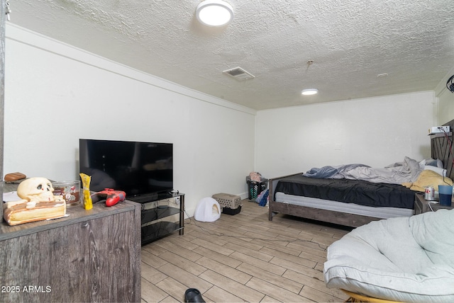 bedroom with a textured ceiling