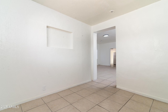 view of tiled empty room