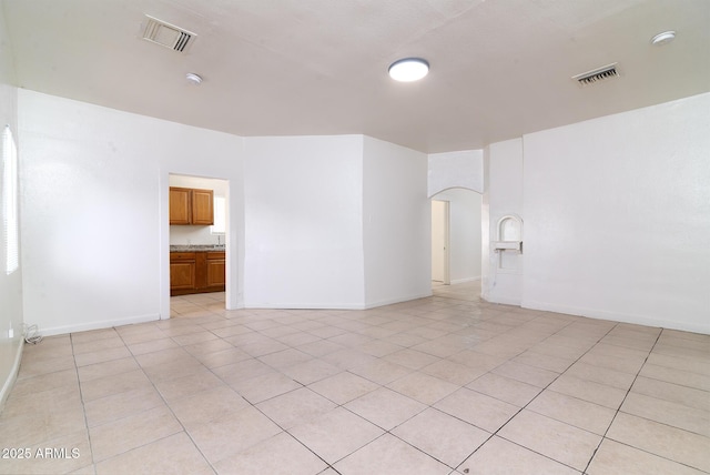 view of tiled spare room