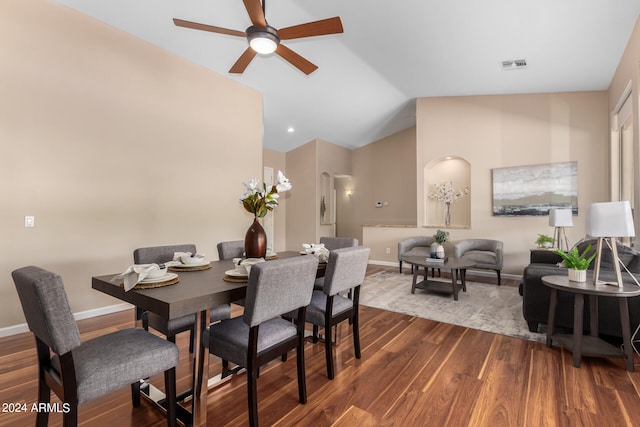 dining room featuring ceiling fan, vaulted ceiling, and hardwood / wood-style floors