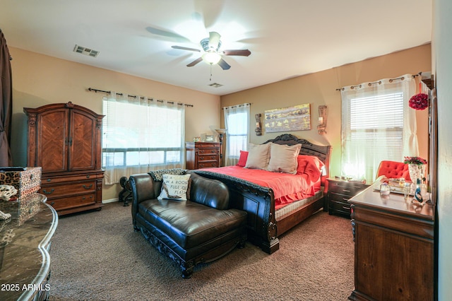 2115 N Cougar Ct, Casa Grande, AZ 85122 - carpeted bedroom with a ceiling fan and visible vents