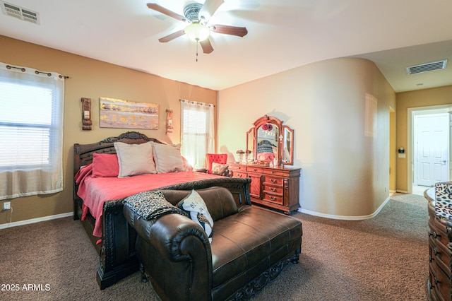 2115 N Cougar Ct, Casa Grande, AZ 85122 - carpeted bedroom with baseboards, multiple windows, and visible vents
