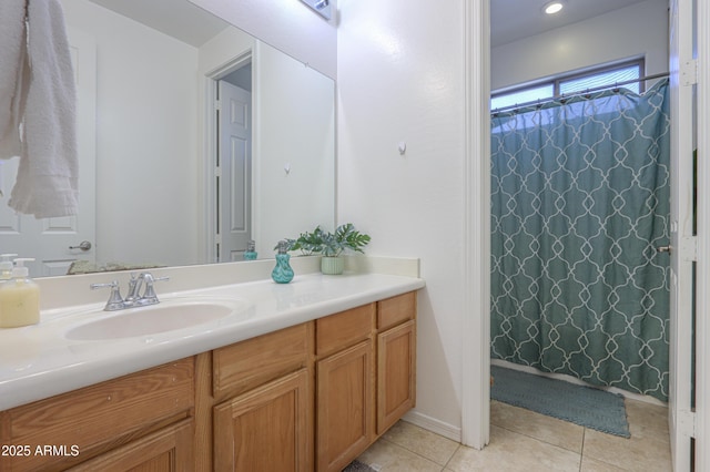 2115 N Cougar Ct, Casa Grande, AZ 85122 - bathroom featuring a shower with shower curtain, tile patterned floors, and vanity