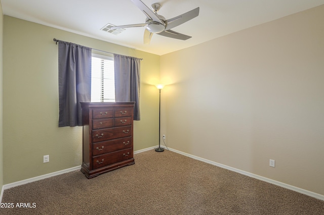 2115 N Cougar Ct, Casa Grande, AZ 85122 - unfurnished bedroom featuring carpet, visible vents, baseboards, and ceiling fan