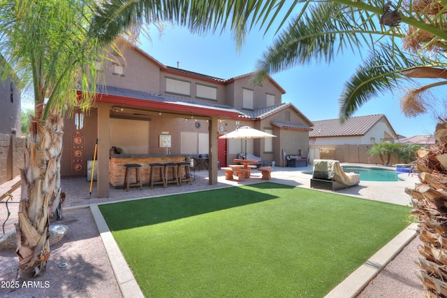 2115 N Cougar Ct, Casa Grande, AZ 85122 - view of yard with a patio, outdoor dry bar, a fenced backyard, and a fenced in pool